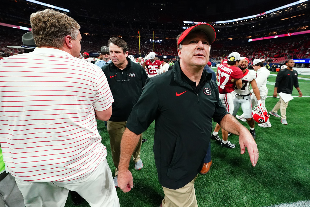 Dec 2, 2023; Atlanta, GA, USA; Georgia Bulldogs head coach Kirby Smart walks on field after the Alabama Crimson Tide defeated the Georgia Bulldogs in the SEC Championship at Mercedes-Benz Stadium. Mandatory Credit: John David Mercer-USA TODAY Sports  