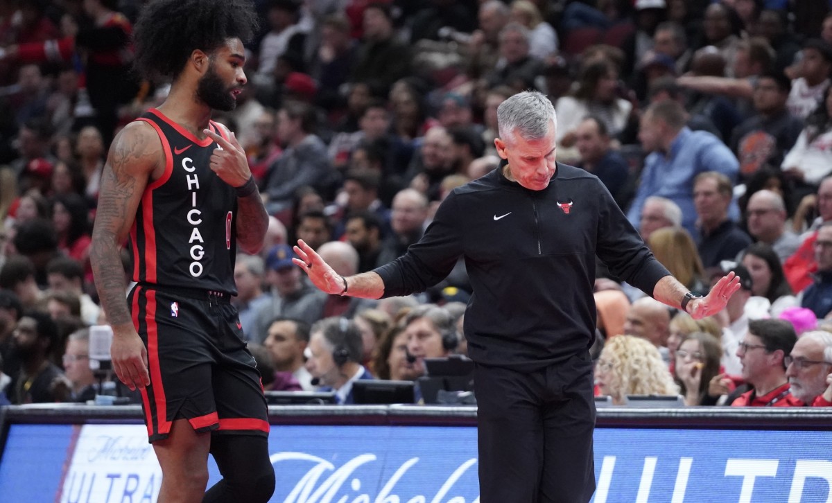 Chicago Bulls head coach Billy Donovan gestures to guard Coby White (0) during the second half at United Center.