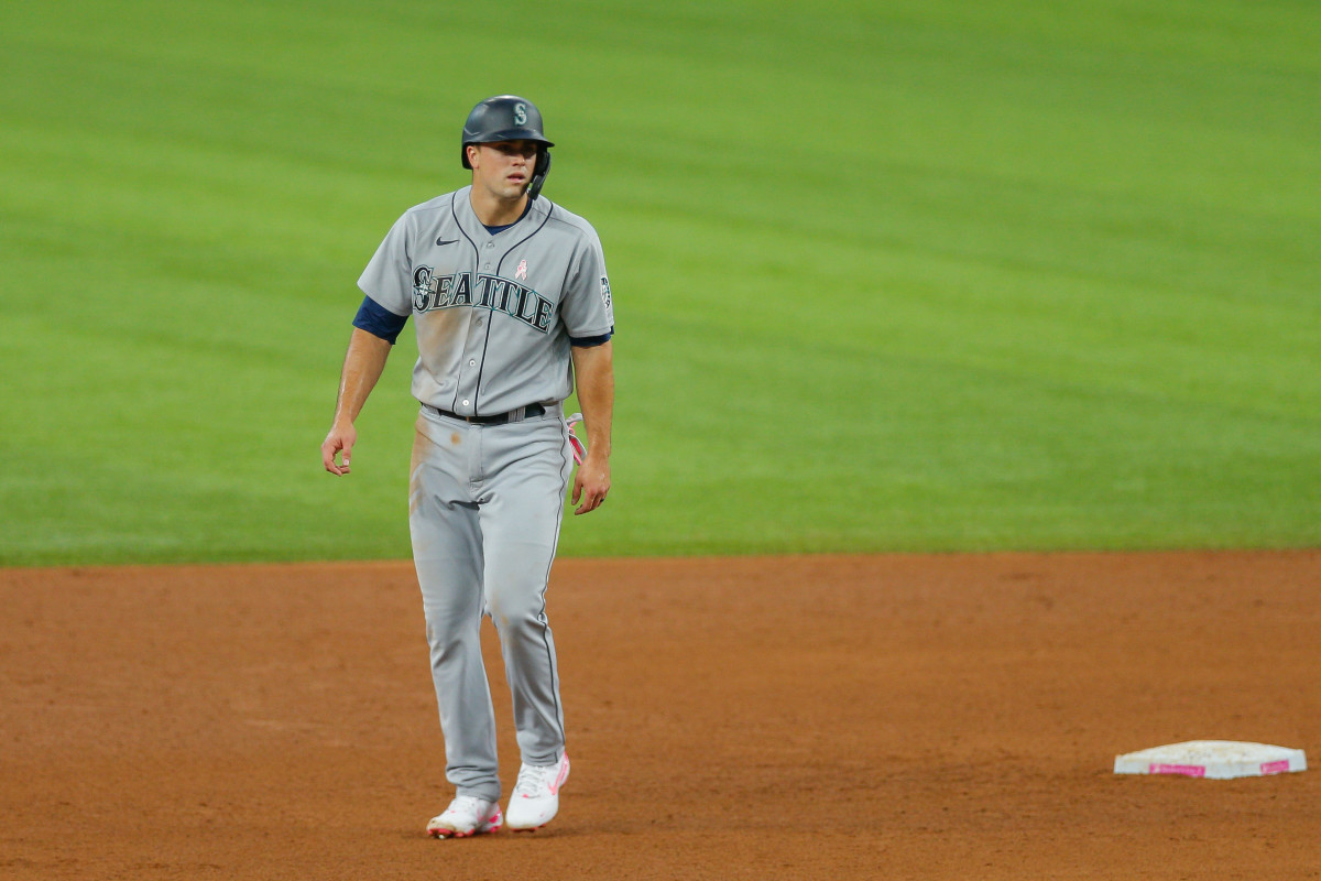 May 9, 2021; Arlington, Texas, USA; Seattle Mariners first baseman Evan White (12) leads off from second base during the fifth inning against the Texas Rangers at Globe Life Field. Mandatory Credit: Andrew Dieb-USA TODAY Sports  