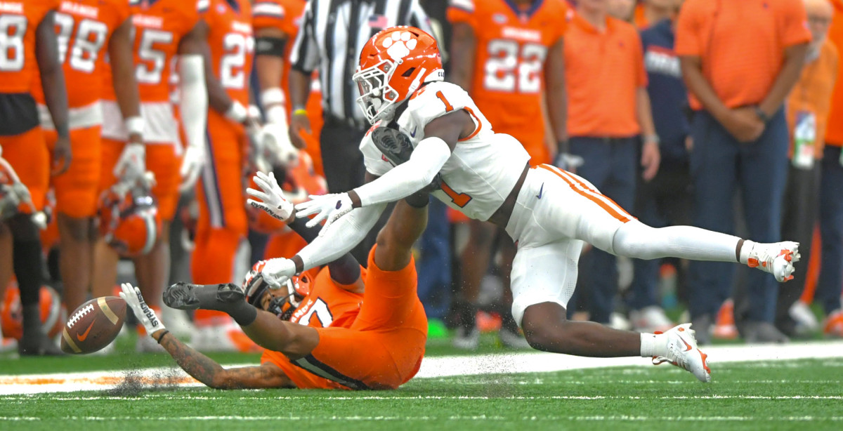 Sep 30, 2023; Syracuse, New York, USA; Clemson Tigers safety Andrew Mukuba (1) breaks up a pass for Syracuse Orange receiver Umari Hatcher (17) during the second quarter at JMA Wireless Dome Mandatory Credit: Ken Ruinard-USA TODAY Sports  