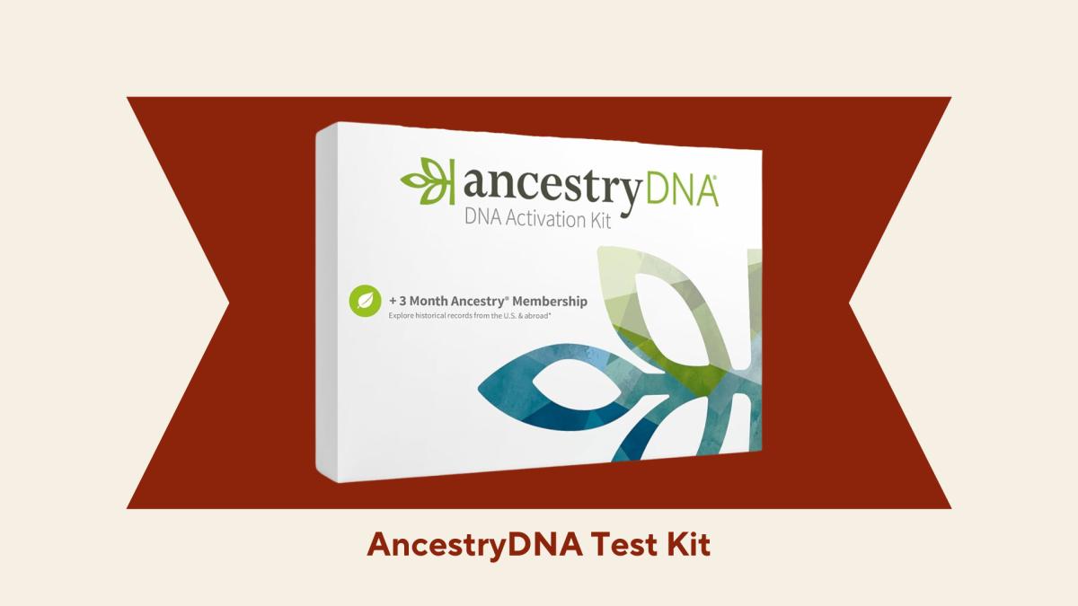 The AncestryDNA test kit against a red and beige background