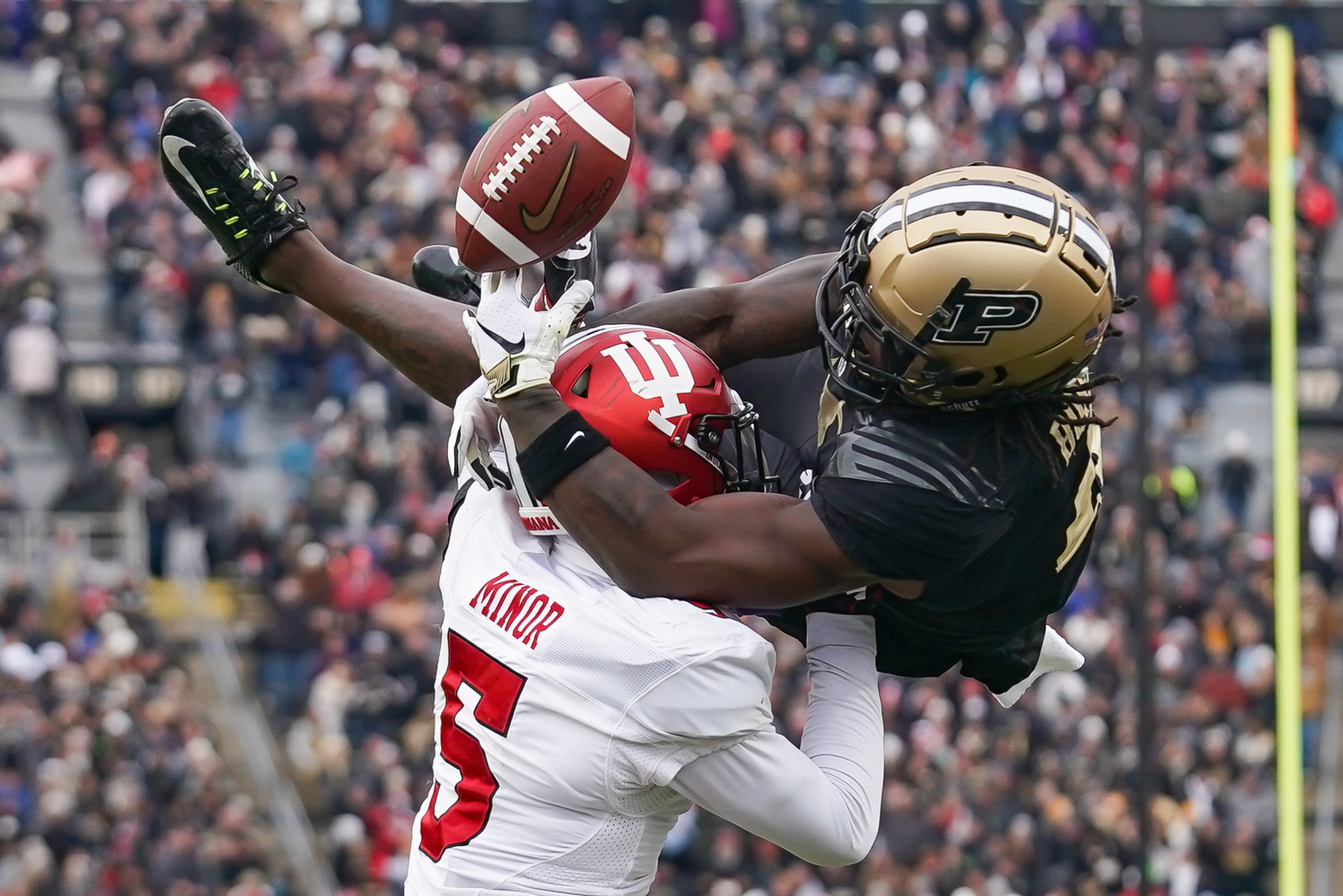 Purdue Boilermakers wide receiver Deion Burks attempts a catch against the Indian Hoosiers.