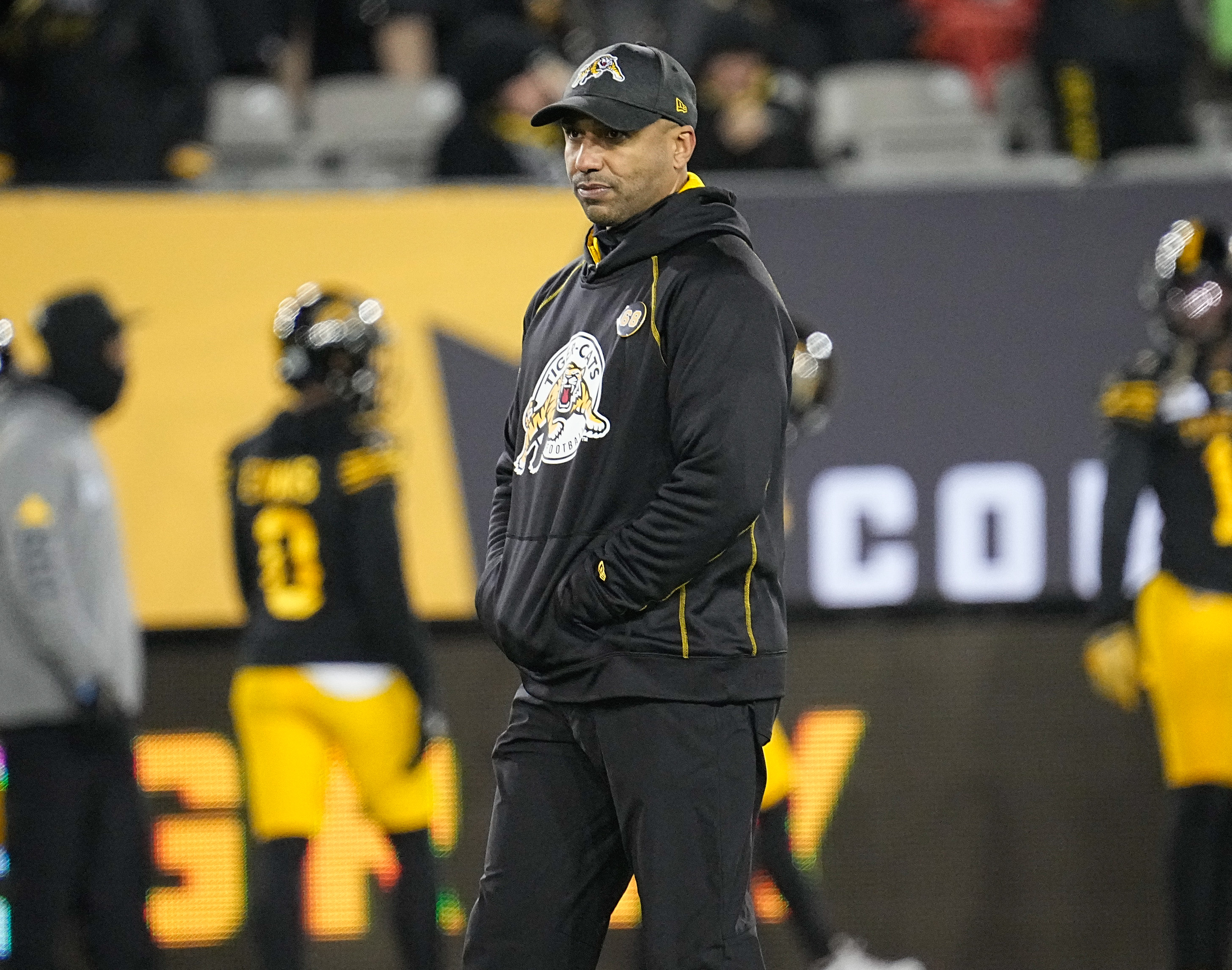 Dec 12, 2021; Hamilton, Ontario, CAN; Hamilton Tiger-Cats head coach Orlondo Steinauer during the warm ups of the 108th Grey Cup football game against the Winnipeg Blue Bombers at Tim Hortons Field. Mandatory Credit: John E. Sokolowski-USA TODAY Sports