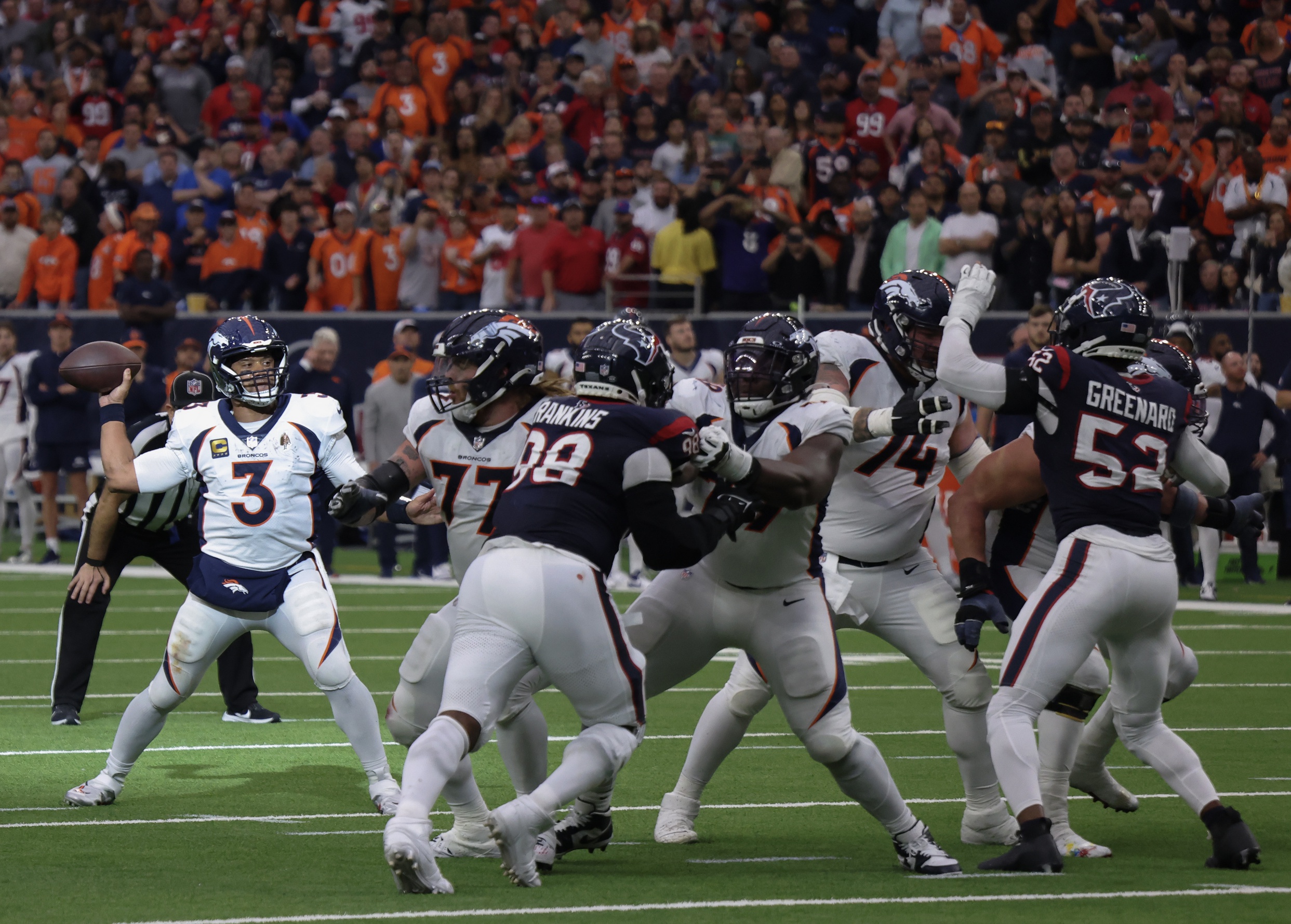 Dec 3, 2023; Houston, Texas, USA; Denver Broncos quarterback Russell Wilson (3) drops back in the pocket against the Houston Texans in the second half at NRG Stadium.