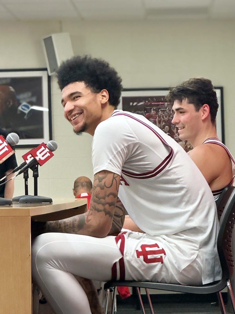 Indiana center Kel'el Ware and senior guard Trey Galloway are all smiles while being interviewed following the Hoosiers' win over Maryland in the Big Ten opener on Friday at Simon Skjodt Assembly Hall.
