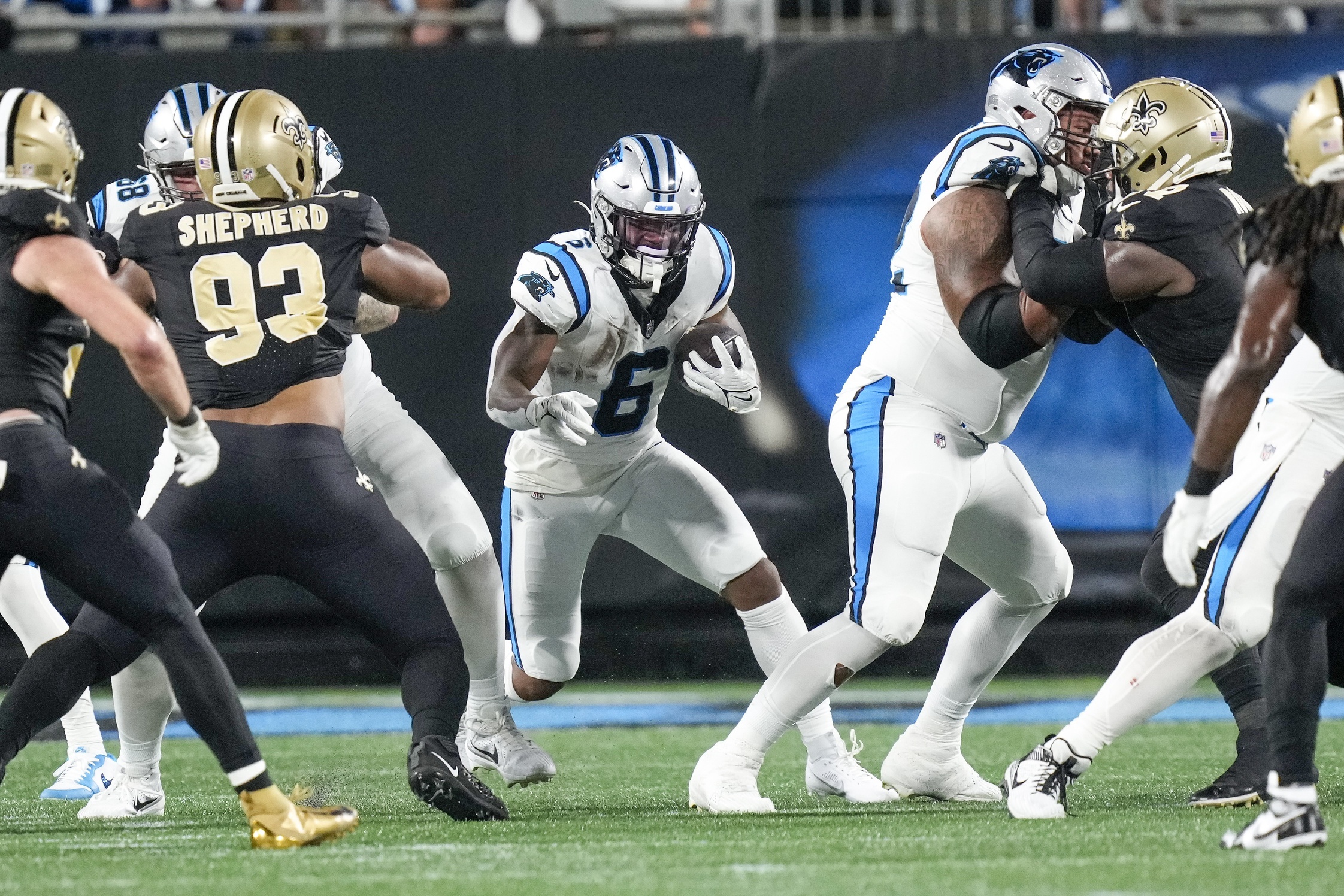 Carolina Panthers running back Miles Sanders (6) looks for yardage on a run play against the New Orleans Saints. Mandatory Credit: Jim Dedmon-USA TODAY