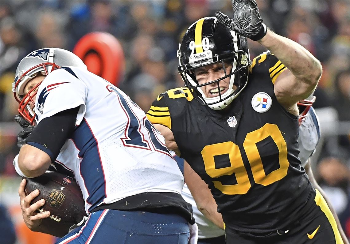 Pittsburgh Steelers linebacker T.J. Watt (90) moves in to sack legendary New England Patriots QB Tom Brady