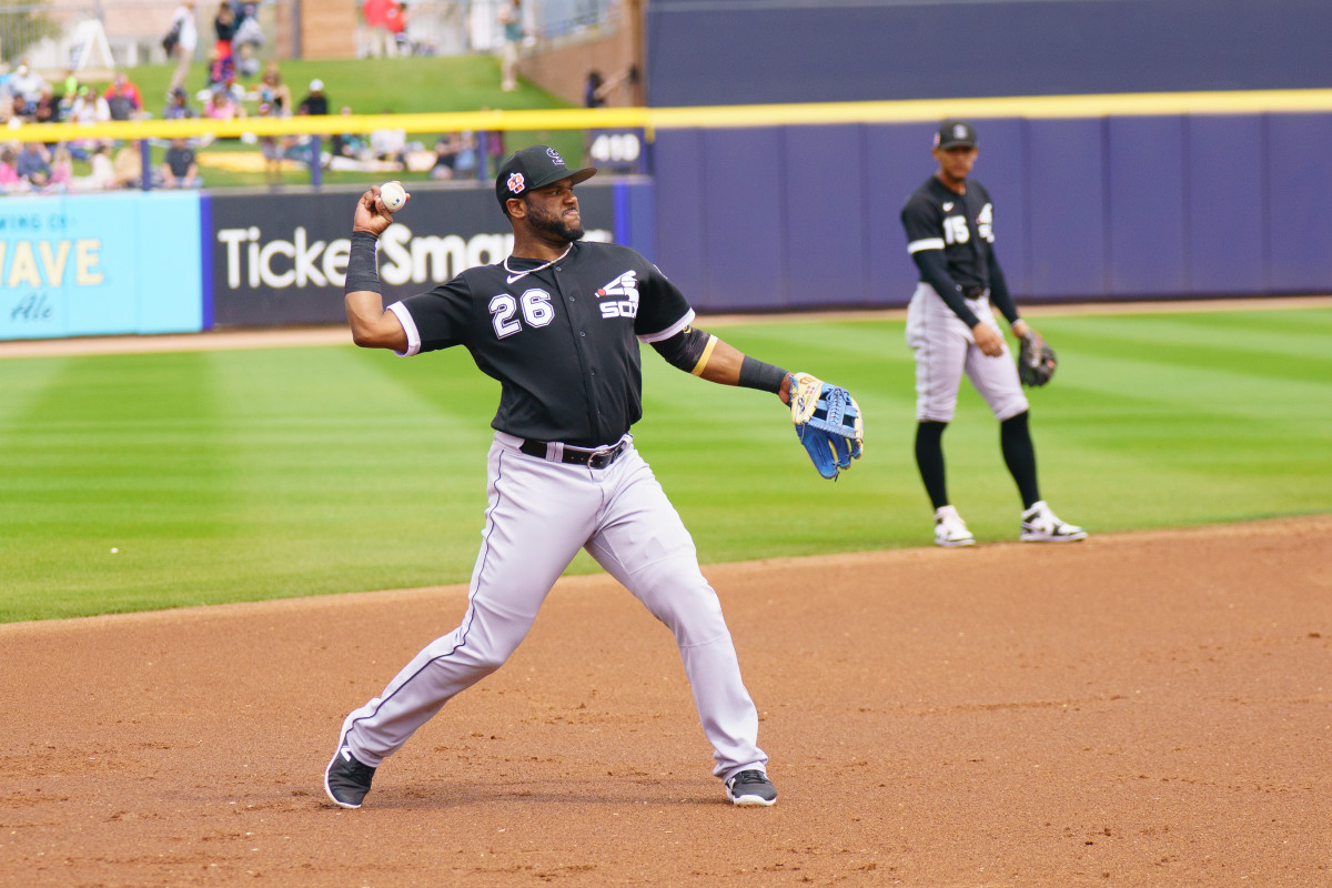 Mar 19, 2023; Peoria, Arizona, USA; Chicago White Sox infielder Leury Garcia (28) throws to first in the second inning against the Seattle Mariners during a spring training game at Peoria Sports Complex.