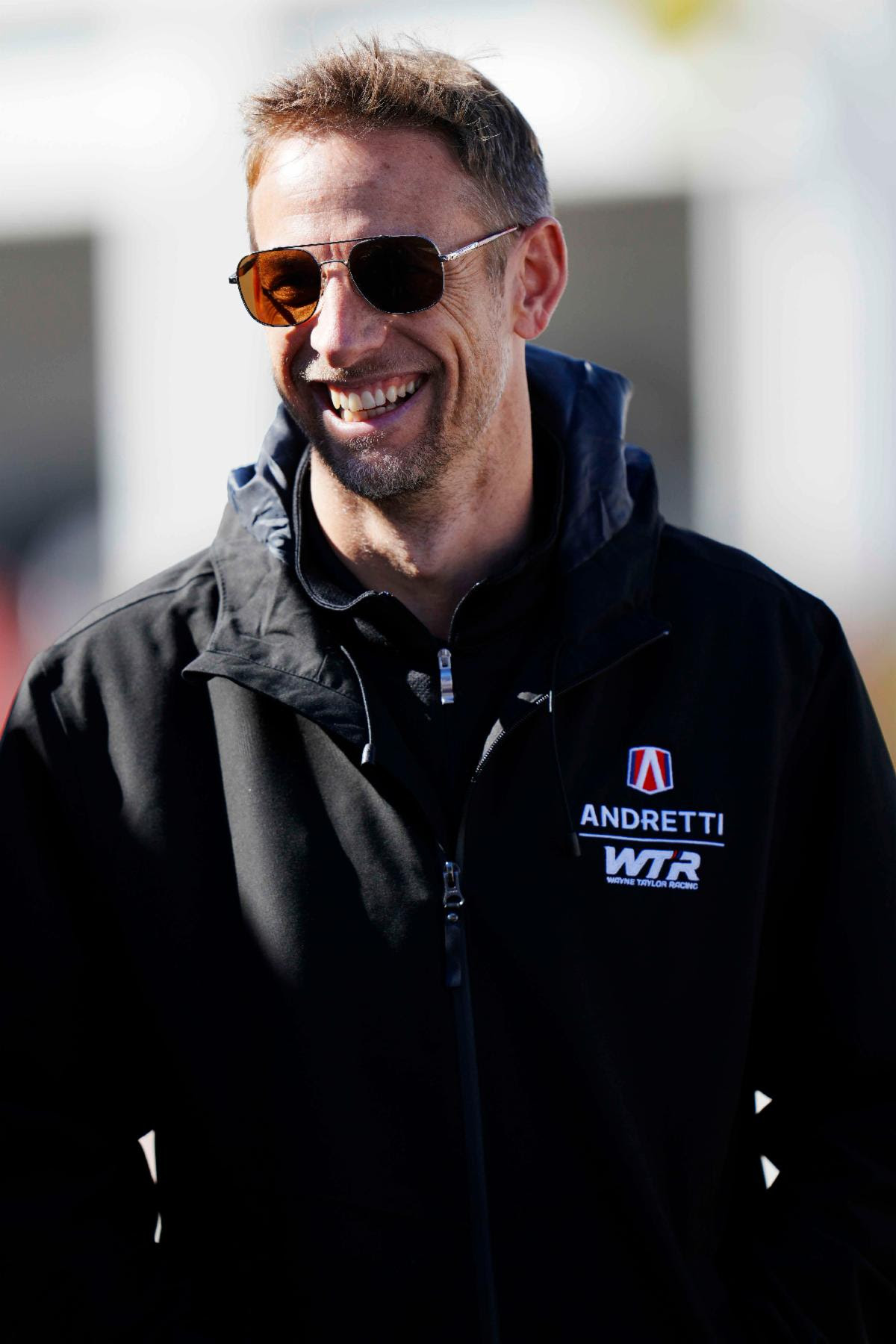 Former Formula One great Jenson Button is all smiles heading into his first full-time season of racing since 2019. Photo courtesy IMSA.
