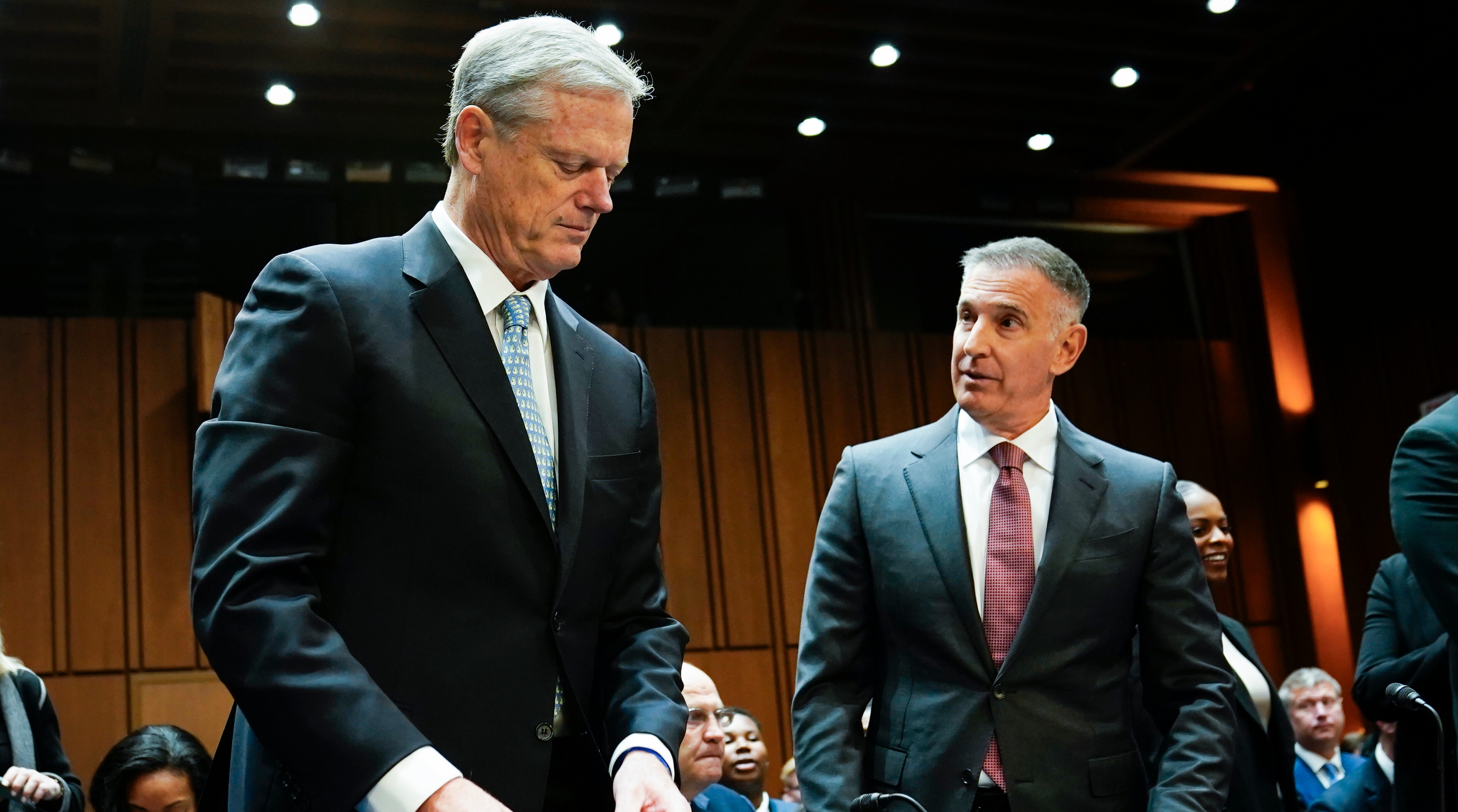 NCAA President Charlie Baker (left) and Big Ten commissioner Tony Petitti (right) stand before the start of the Senate Judiciary Committee hearing on name, image and likeness.