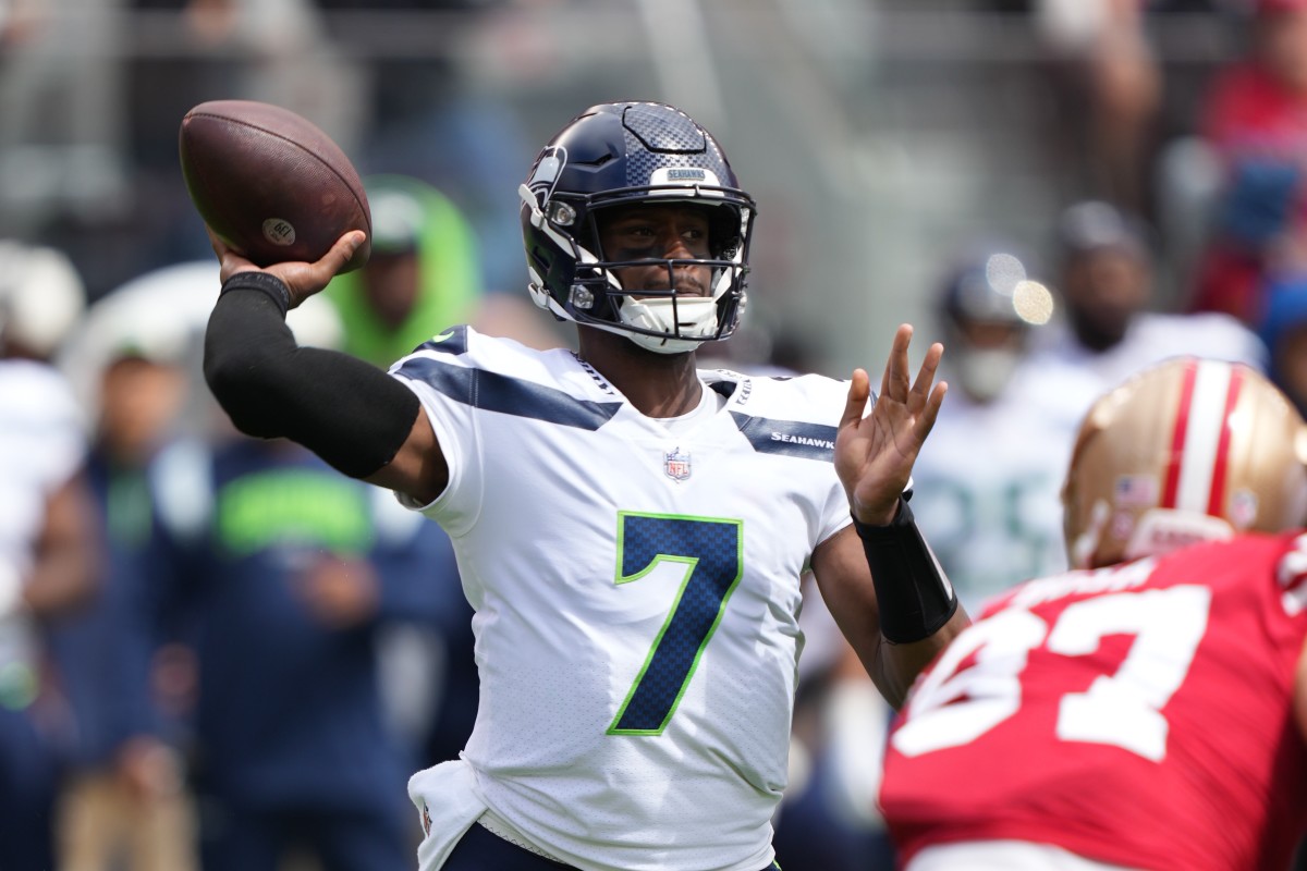 Seattle Seahawks quarterback Geno Smith (7) passes the football against San Francisco 49ers defensive end Nick Bosa (97) during the first quarter at Levi's Stadium.
