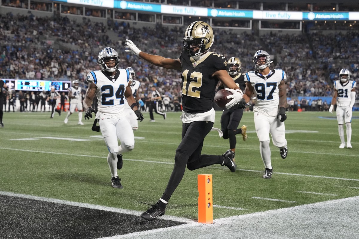 New Orleans Saints wide receiver Chris Olave (12) crosses the goal line but was ruled to have stepped out of bounds earlier