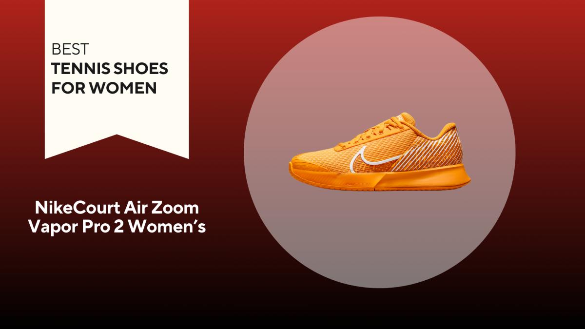 An image of an orange NikeCourt Air Zoom Vapor Pro 2 against a red background.