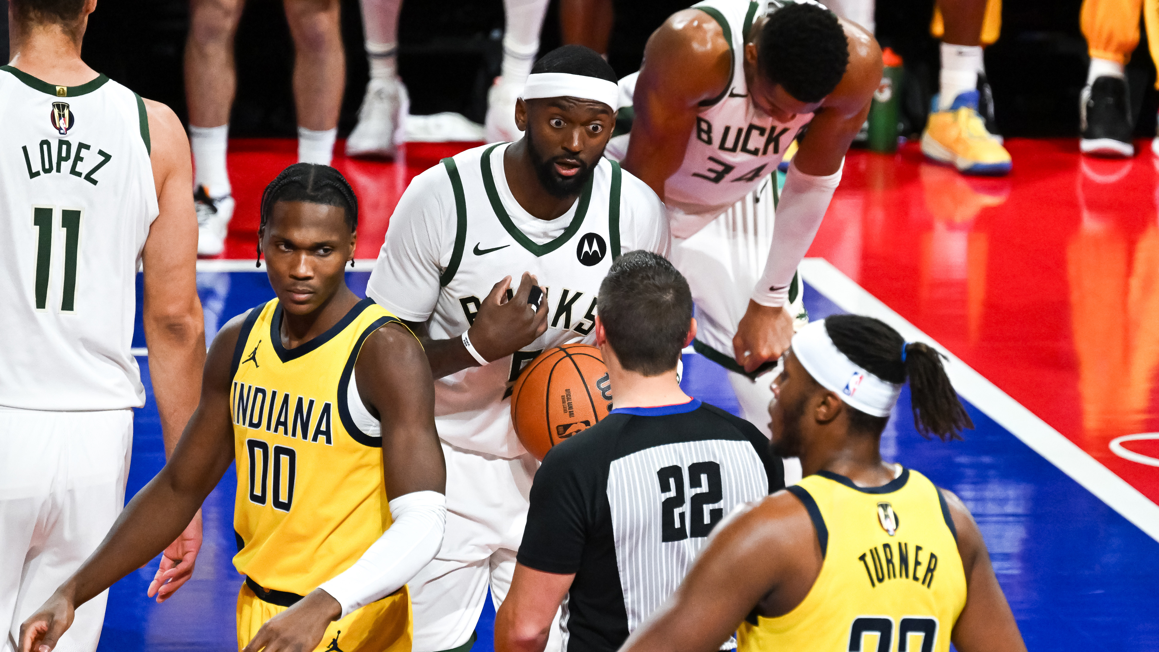 Bobby Portis reacts with surprise while arguing with a referee