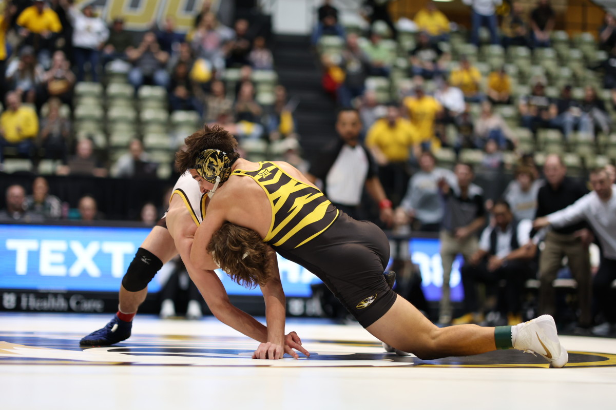 Nate Pulliam (149) defeats No. 23 Wyoming redshirt sophomore Gabe Willochell in a major decision, 21-10.