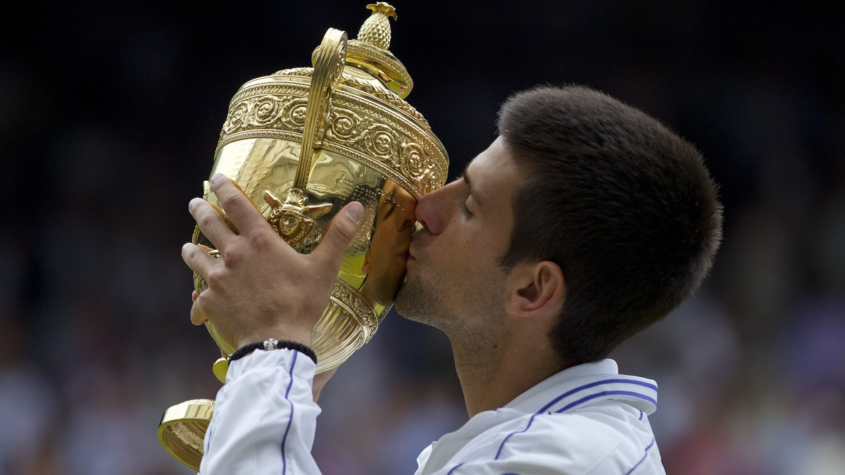 Novak Djokovic celebrates his 2011 Wimbledon win.