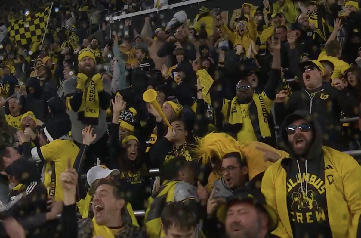 Columbus Crew fans pictured celebrating during their team's victory over LAFC in the 2023 MLS Cup final