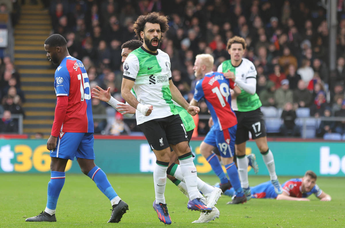 Mohamed Salah pictured (center) celebrating after scoring the 200th goal of his Liverpool career in a 2-1 win at Crystal Palace in December 2023