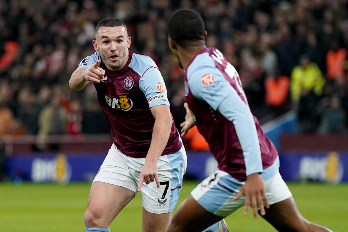 Aston Villa captain John McGinn pictured (left) celebrating after scoring the winning goal in a 1-0 victory over Arsenal in December 2023