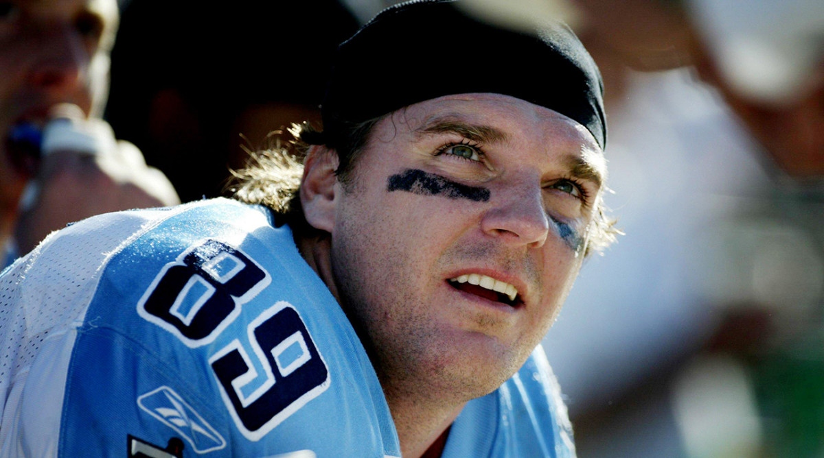 Titans tight end Frank Wycheck sits on the sideline late in the game against the Jaguars at Alltell Stadium.