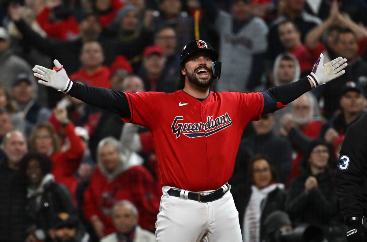Oct 15, 2022; Cleveland, Ohio, USA; Cleveland Guardians catcher Austin Hedges (17) reacts after hitting a single against the New York Yankees in the second inning during game three of the NLDS for the 2022 MLB Playoffs at Progressive Field.
