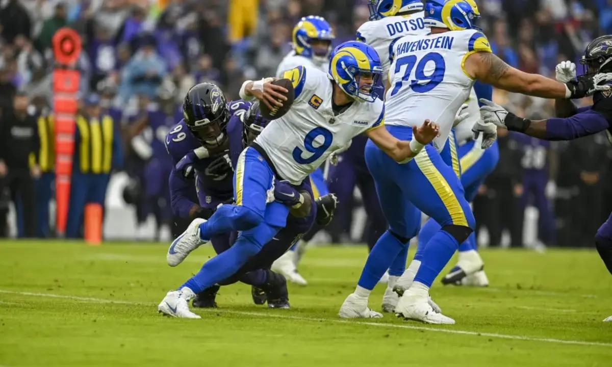 Ravens defenders bring down Rams quarterback Matthew Stafford during Sunday's game.
