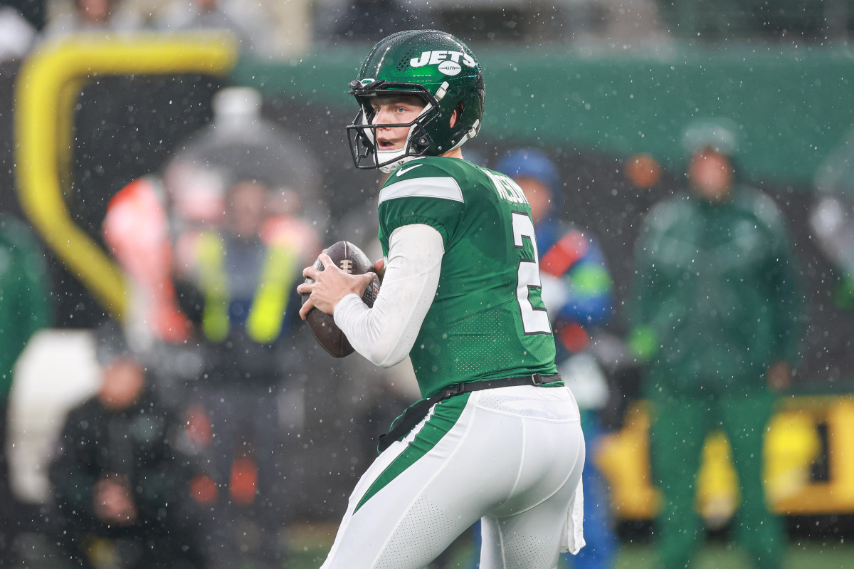 Jets' QB Zach Wilson drops back to pass against Houston