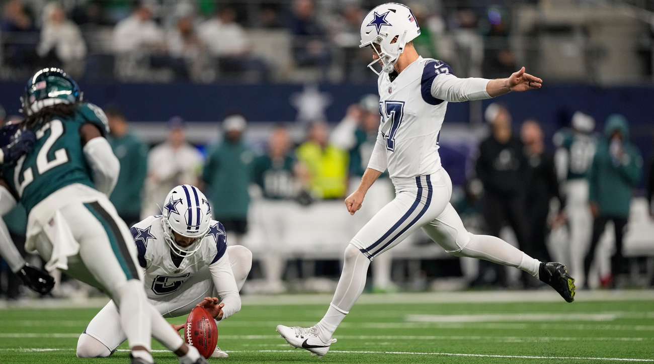 Dallas Cowboys place kicker Brandon Aubrey (17), with Bryan Anger holding, kicks a field goal against the Philadelphia Eagles during the first half of an NFL football game, Sunday, Dec. 10, 2023, in Arlington, Texas. (AP Photo/Sam Hodde)