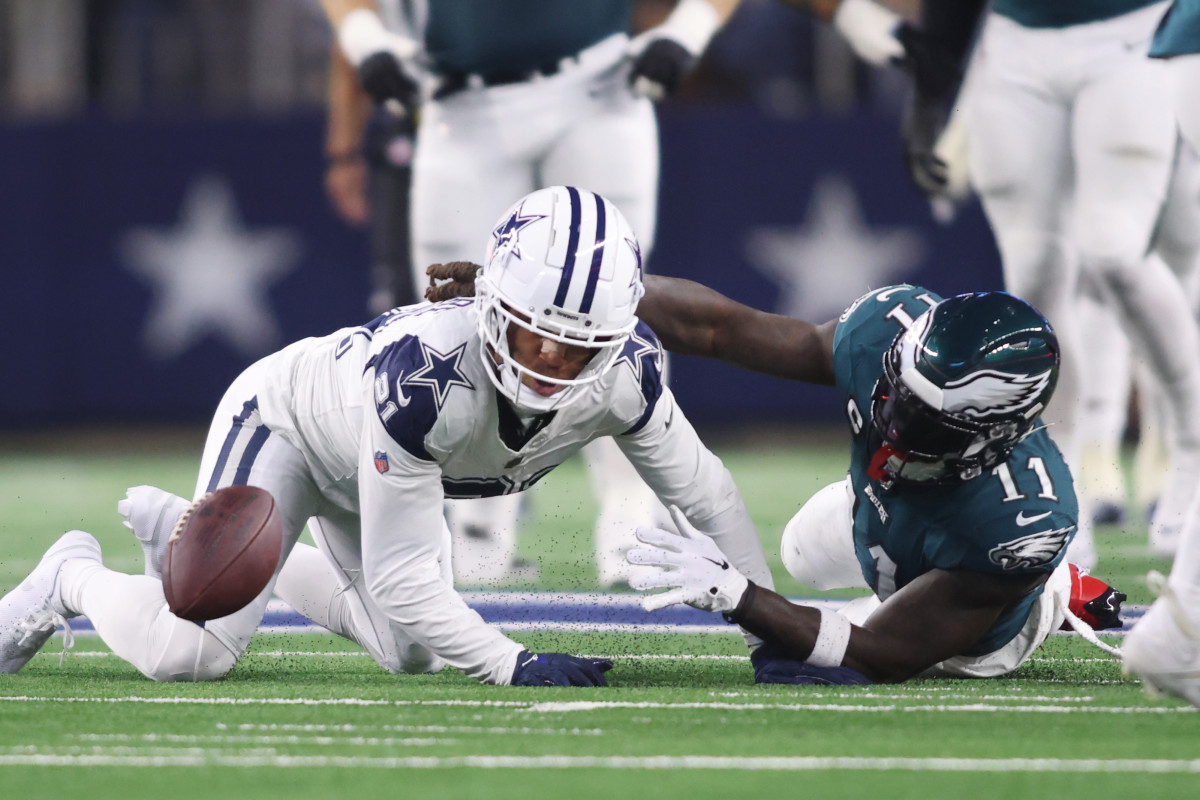 Philadelphia Eagles wide receiver A.J. Brown (11) fumbles the ball after being tackled by Dallas Cowboys cornerback Stephon Gilmore (21) in the second half at AT&T Stadium.