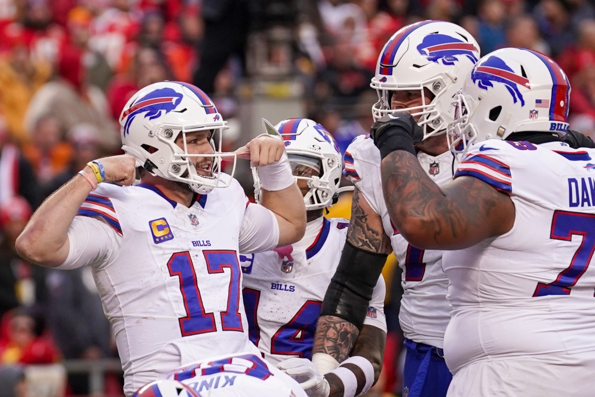 Allen celebrates with teammates after scoring a touchdown in Buffalo's win over the Chiefs.