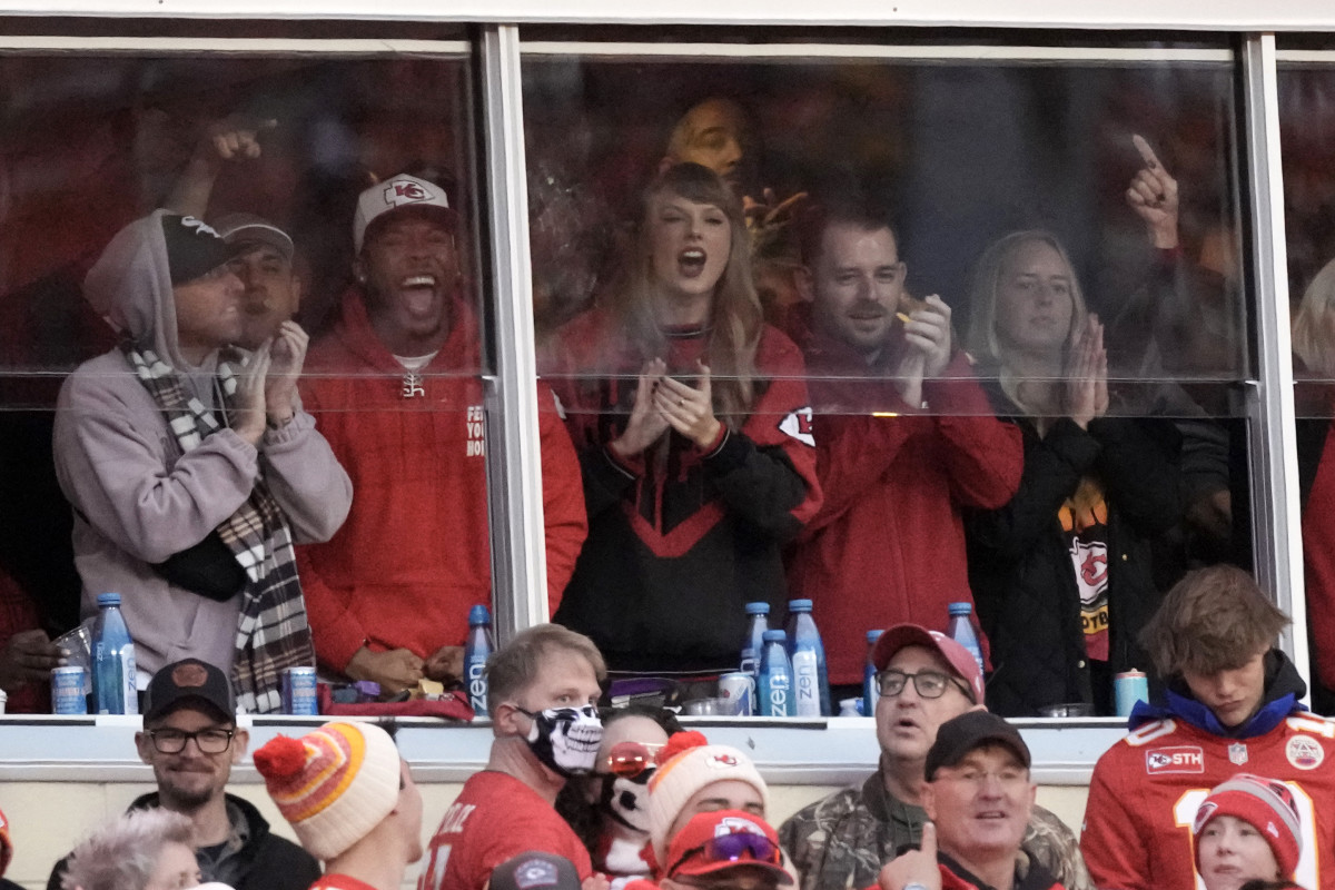 Taylor Swift watches from a suite during the first half of an NFL football game between the Kansas City Chiefs and the Buffalo Bills Sunday, Dec. 10, 2023, in Kansas City, Mo. (AP Photo/Charlie Riedel)   