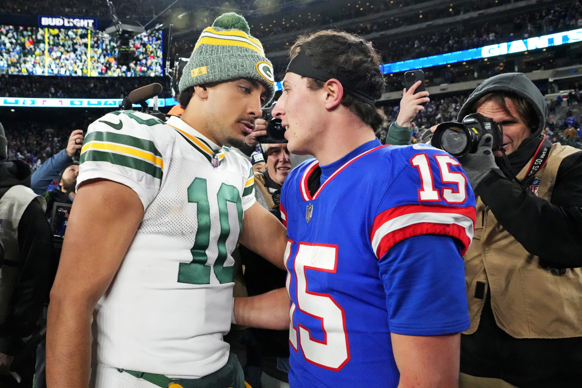 Green Bay Packers quarterback Jordan Love and New York Giants quarterback Tommy DeVito chat after Monday night’s game at MetLife Stadium.