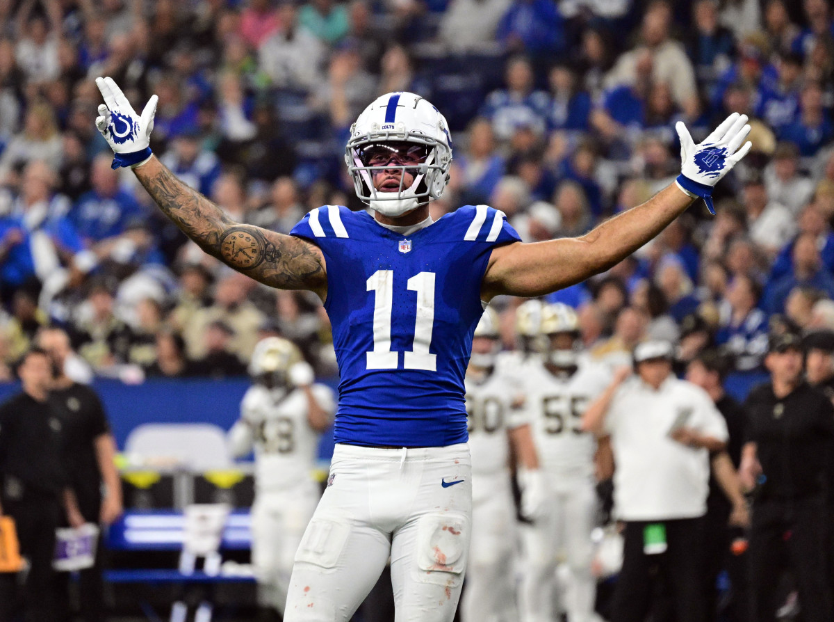 Oct 29, 2023; Indianapolis, Indiana, USA; Indianapolis Colts wide receiver Michael Pittman Jr. (11) celebrates during the first half of the game against the New Orleans Saints at Lucas Oil Stadium. Mandatory Credit: Marc Lebryk-USA TODAY Sports