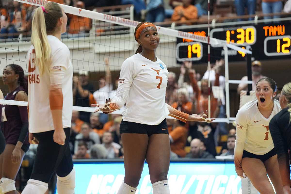 Texas middle blocker Asjia O'Neal (7) reacts after scoring a point following a hit during the NCAA game against Texas A&M at Gregory Gymnasium on Thursday, Nov. 30, 2023