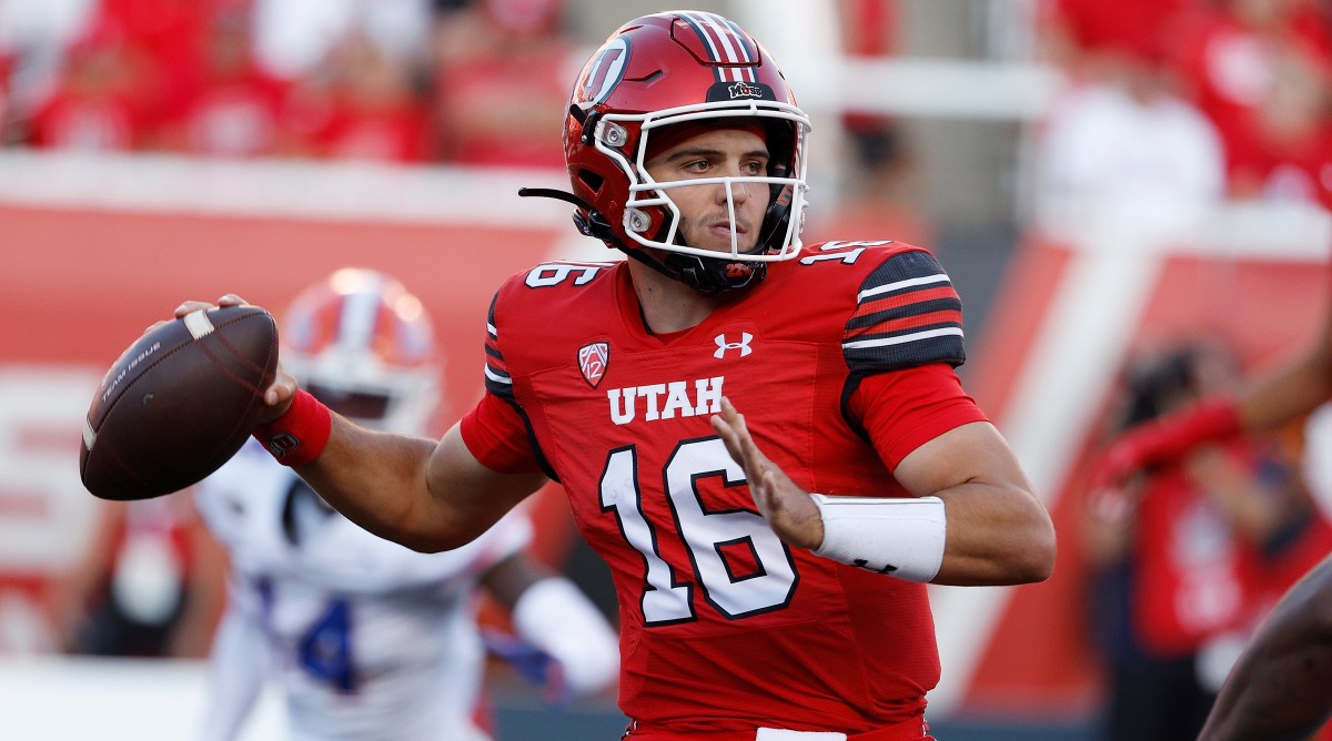 Utah quarterback Bryson Barnes throws a football during a game against Florida.