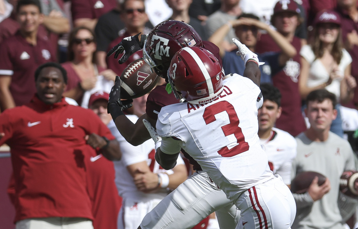 Oct 7, 2023; College Station, Texas, USA; Texas A&M Aggies wide receiver Moose Muhammad III (7) attempts to make a reception as Alabama Crimson Tide defensive back Terrion Arnold (3) /defends during the second quarter at Kyle Field.