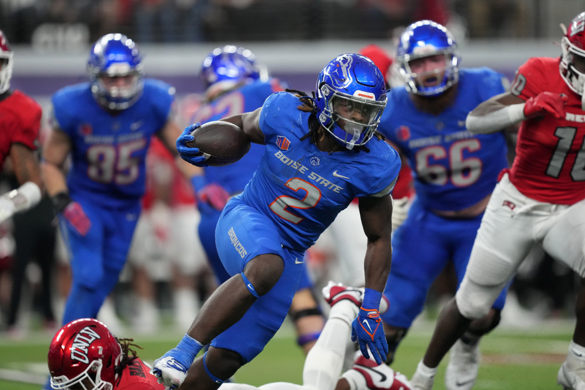 Dec 2, 2023; Las Vegas, NV, USA; Boise State Broncos running back Ashton Jeanty (2) carries the ball against the UNLV Rebels in the second half during the Mountain West Championship at Allegiant Stadium. Mandatory Credit: Kirby Lee-USA TODAY Sports