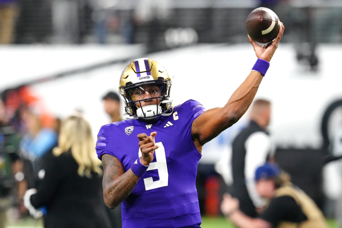 Dec 1, 2023; Las Vegas, NV, USA; Washington Huskies quarterback Michael Penix Jr. (9) warms up before a game against the Oregon Ducks at Allegiant Stadium. Mandatory Credit: Stephen R. Sylvanie-USA TODAY Sports