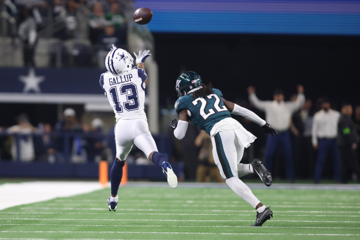 Dallas Cowboys wide receiver Michael Gallup (13) catches a pass against Philadelphia Eagles cornerback Kelee Ringo (22) in the fourth quarter at AT&T Stadium.