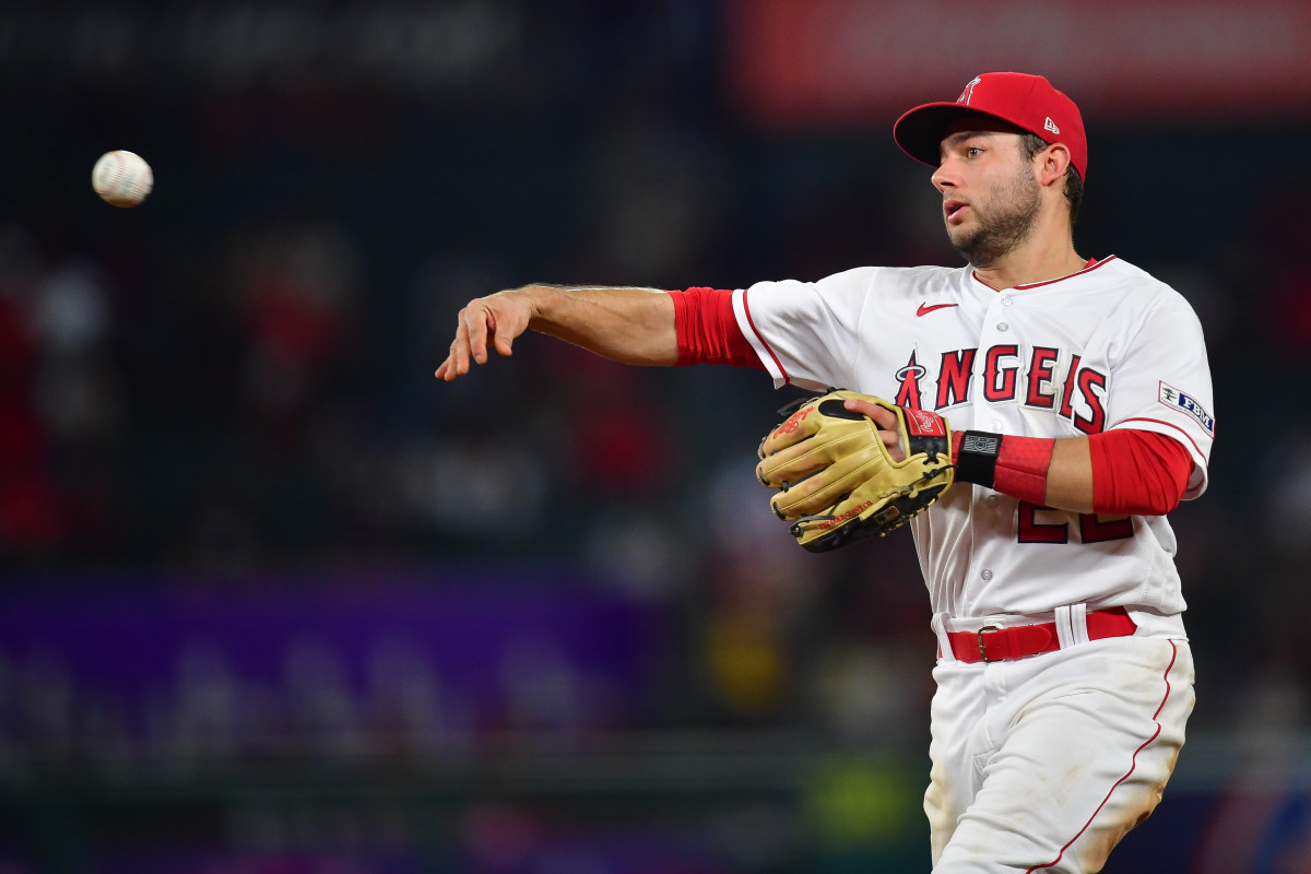 Sep 26, 2023; Anaheim, California, USA; Los Angeles Angels second baseman David Fletcher (22) throws to first for the out against Texas Rangers shortstop Josh Smith (47) during the seventh inning at Angel Stadium.