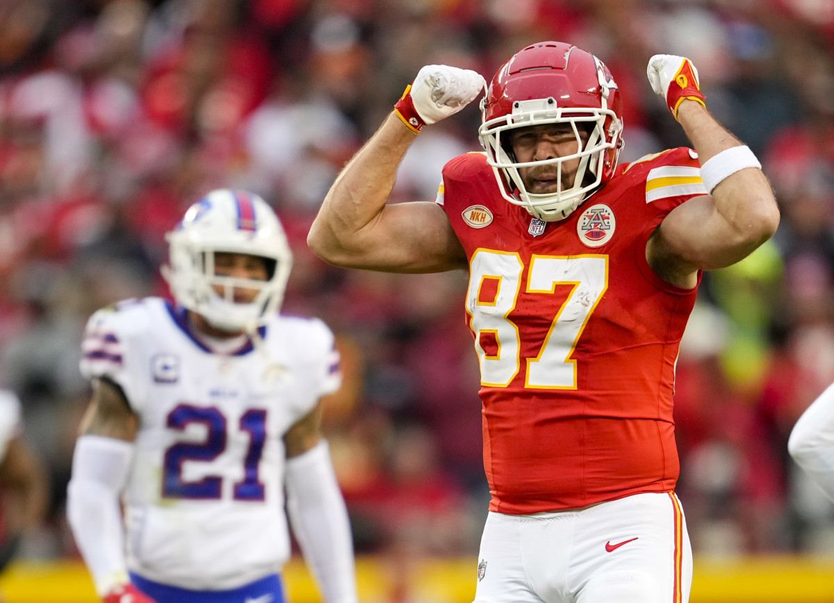 Kansas City Chiefs tight end Travis Kelce celebrates after picking up a first down against the Buffalo Bills during the first half at GEHA Field at Arrowhead Stadium.