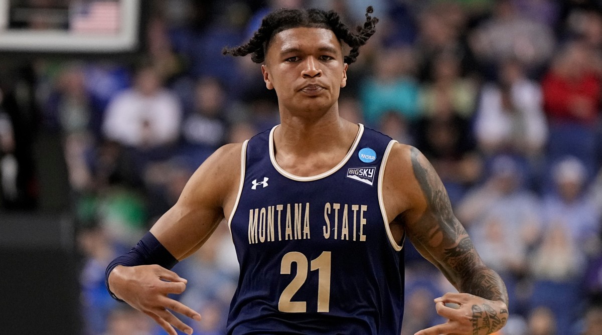 Montana State men’s basketball player RaeQuan Battle celebrates after scoring a basket against Kansas State.