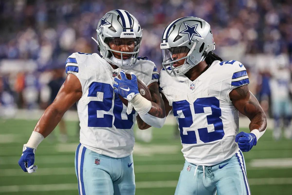 Tony Pollard (20) and Rico Dowdle (23) are proving to be a good running back tandem for the Cowboys.