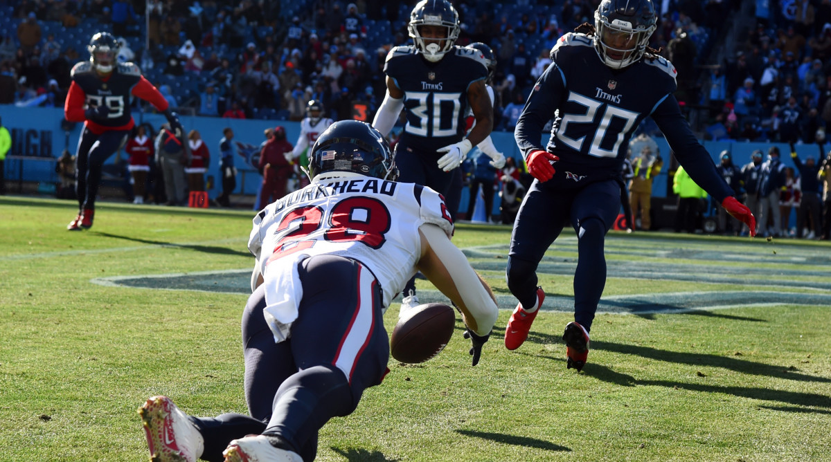 Texans running back Rex Burkhead fumbles near the end zone