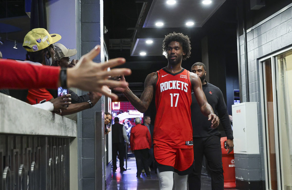 Houston Rockets forward Tari Eason (17) is congratulated by fans after the game against the San Antonio Spurs at Toyota Center.