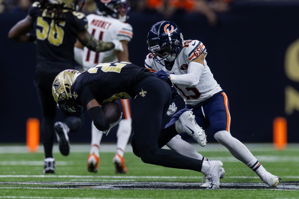 New Orleans Saints cornerback Paulson Adebo (29) intercepts a pass intended for Chicago Bears receiver Tyler Scott (13). Mandatory Credit: Stephen Lew-USA TODAY Sports