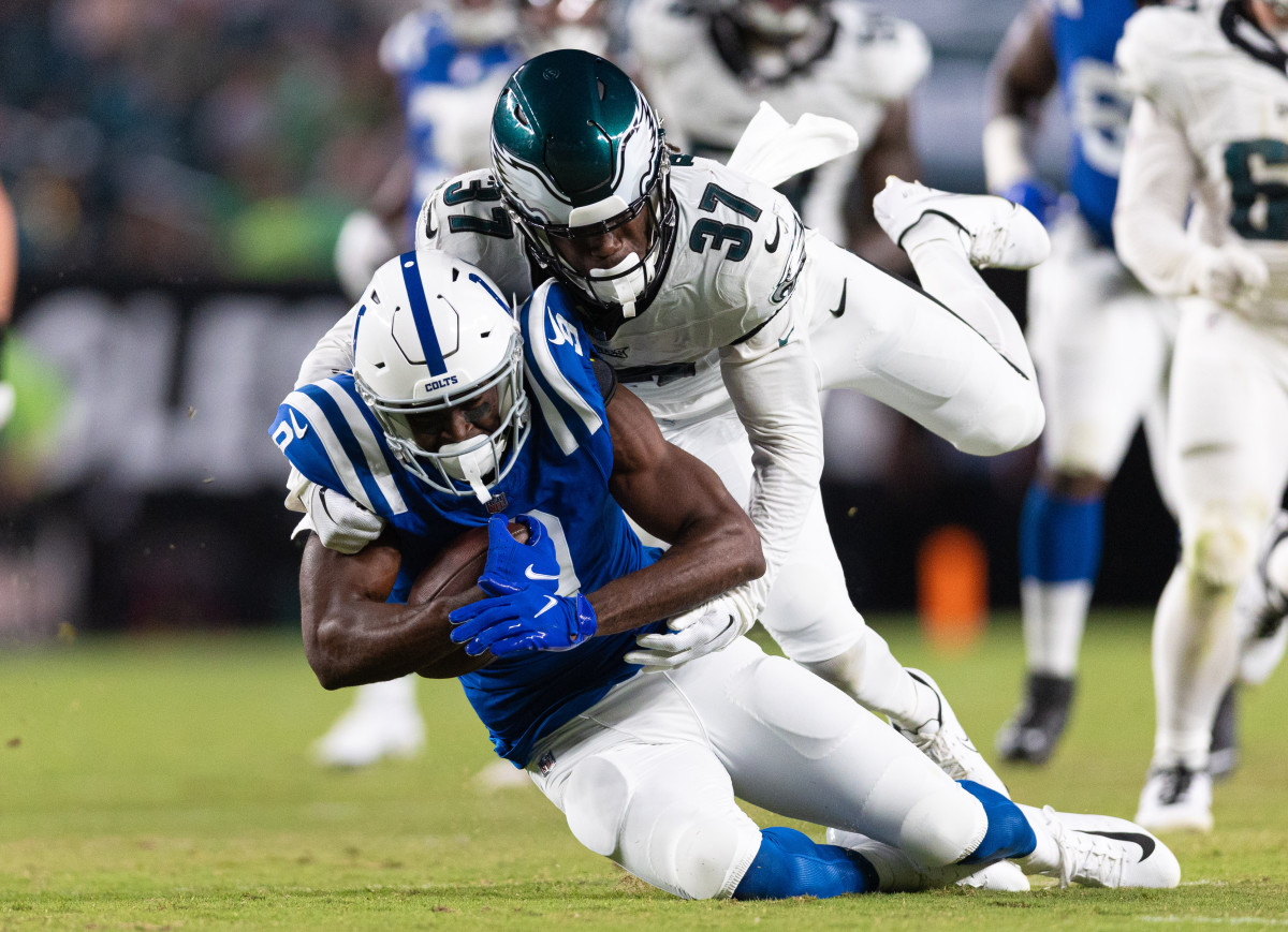 Philadelphia Eagles cornerback Kelee Ringo (37) tackles Indianapolis Colts wide receiver Breshad Perriman (9) after his catch during the third quarter at Lincoln Financial Field.