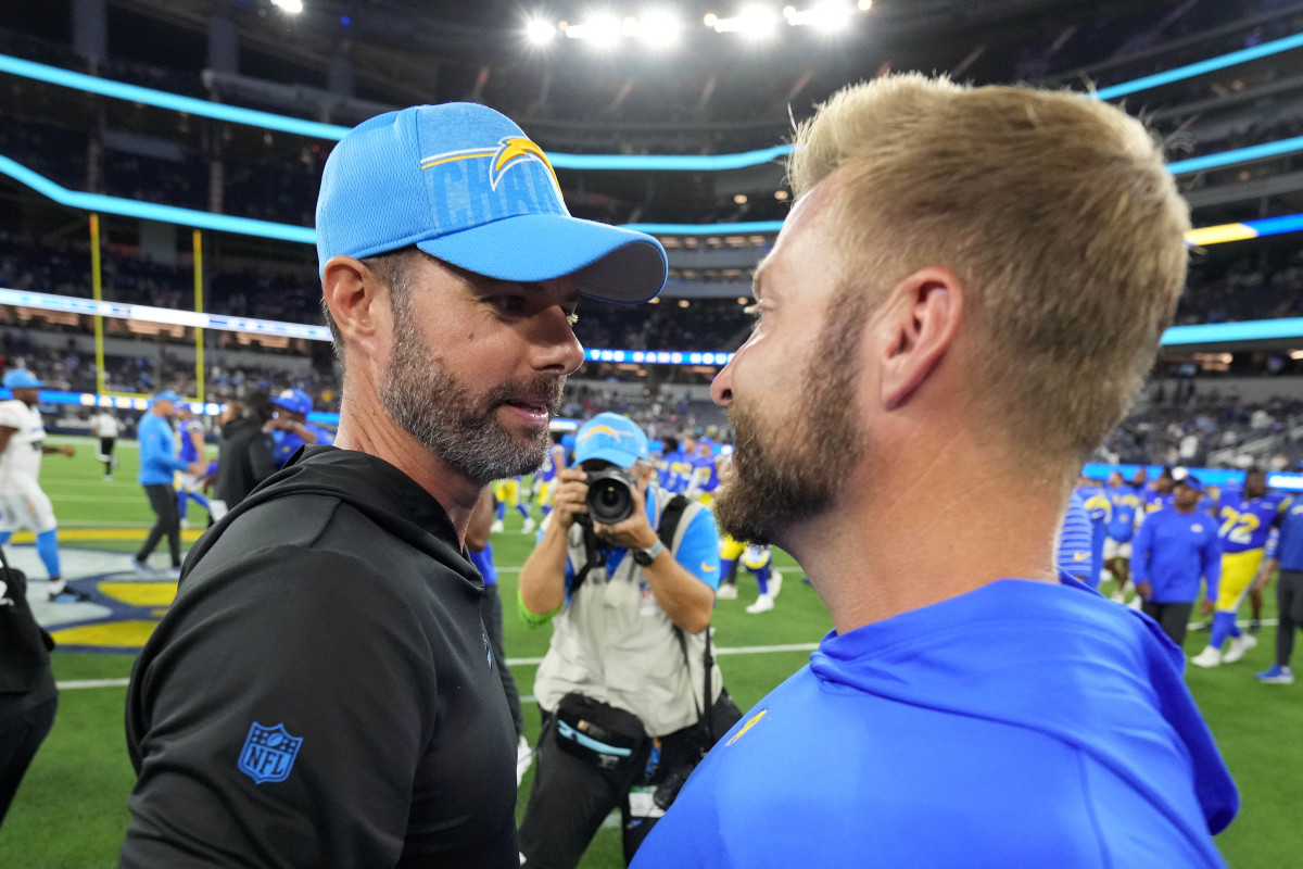 Los Angeles Chargers coach Brandon Staley (left) talks with Los Angeles Rams coach Sean McVay after the game at SoFi Stadium.