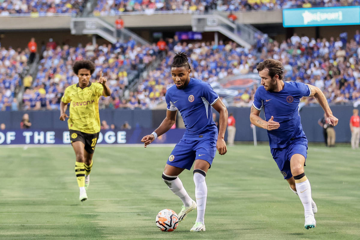 Christopher Nkunku pictured (center) playing for Chelsea in a pre-season friendly against Borussia Dortmund in August 2023