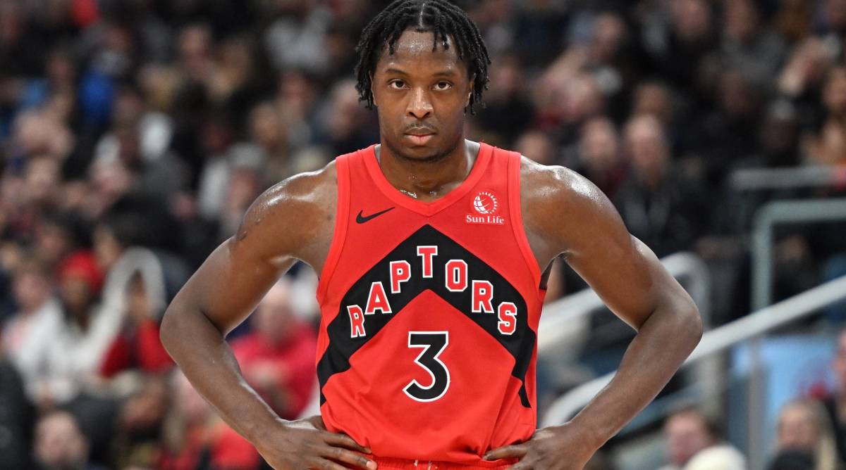 Raptors forward O.G. Anunoby puts his hands on his hips during a game.